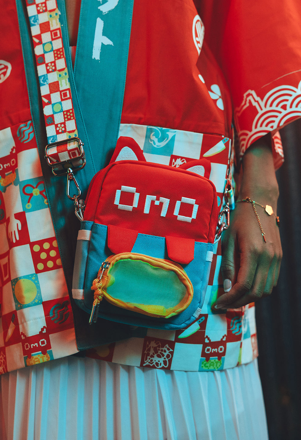 
                  
                    OMOCAT Crossbody Bag
                  
                