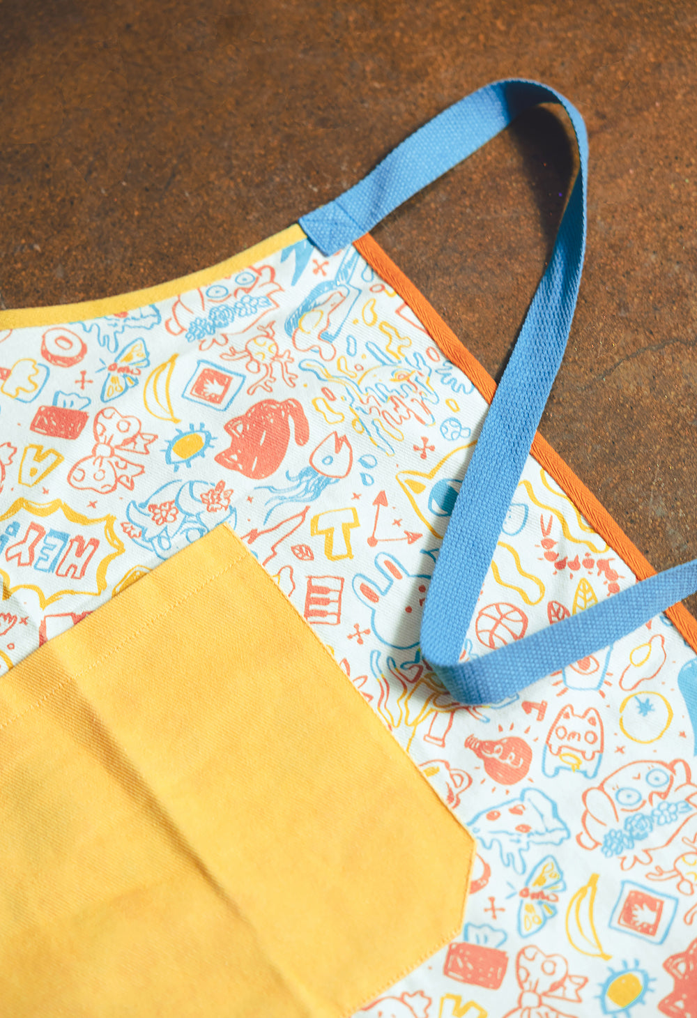
                  
                    OMOCAT Doodle Apron
                  
                